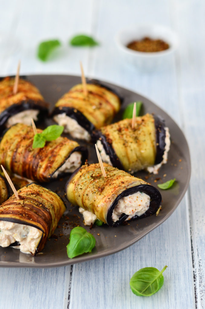 Grilled Aubergine and Courgette Rolls filled with a mixture of cheese, sundried tomatoes, lemon, and basil are ideal as a summer vegetarian appetizer.