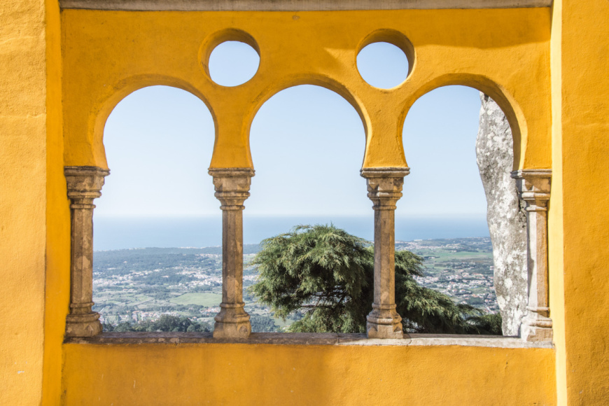 Day trip from Lisbon to Sintra is a perfect trip for a romantic soul and visiting Pena Palace will bring you back to your childhood.