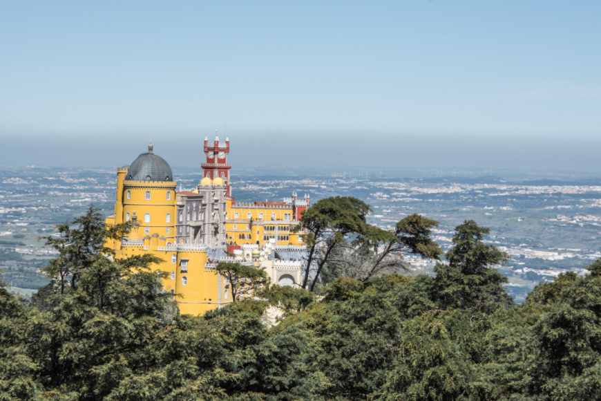 Day trip from Lisbon to Sintra is a perfect trip for a romantic soul and visiting Pena Palace will bring you back to your childhood.