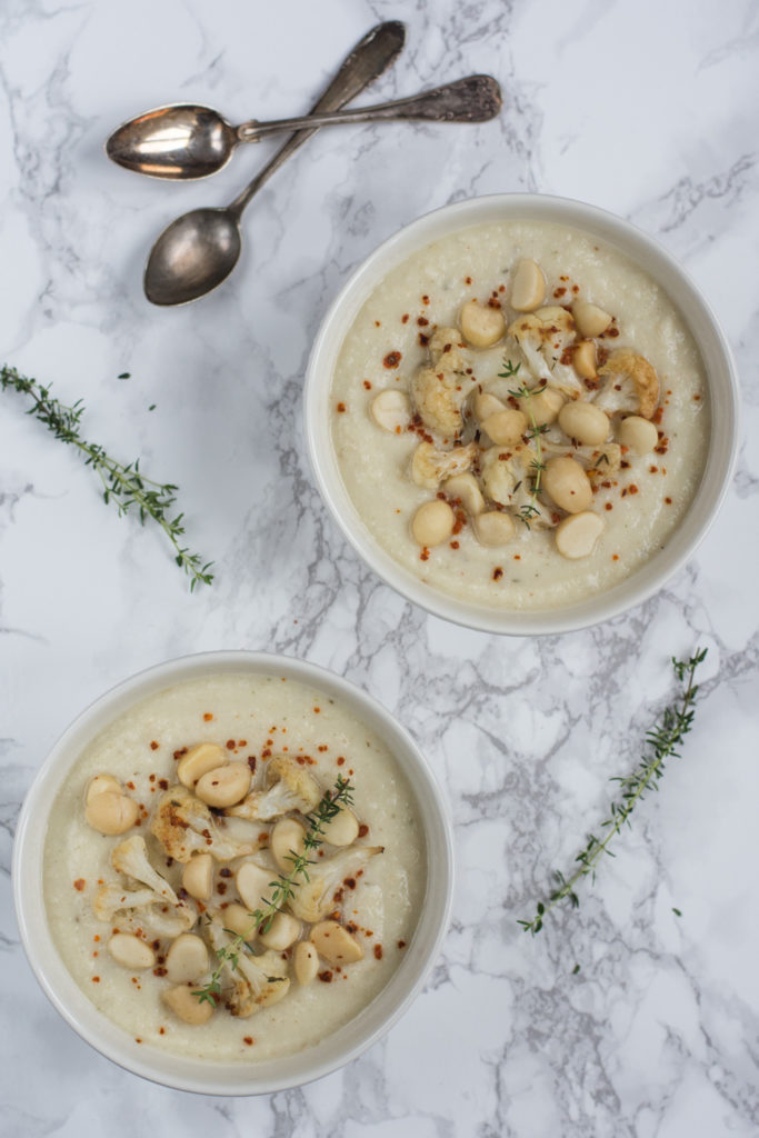 This Roasted Cauliflower Soup is dense and creamy with a taste of garlic, spices, and thyme. The recipe is vegan as I used almond milk instead of cream.