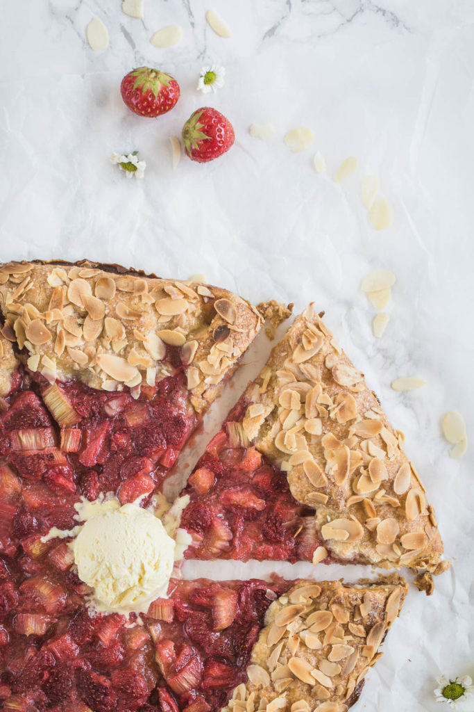 Rustic Strawberry & Rhubarb Almond Galette is a perfect, elegant yet easy to make summer dessert, especially when served with vanilla ice cream!
