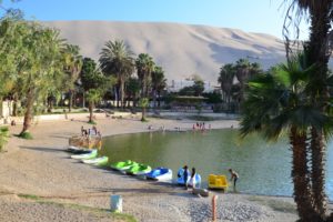 Huacachina is a village in the Southern Peru, concentrated around a fairy tale lagoon, surrounded by desert and its giant dunes.