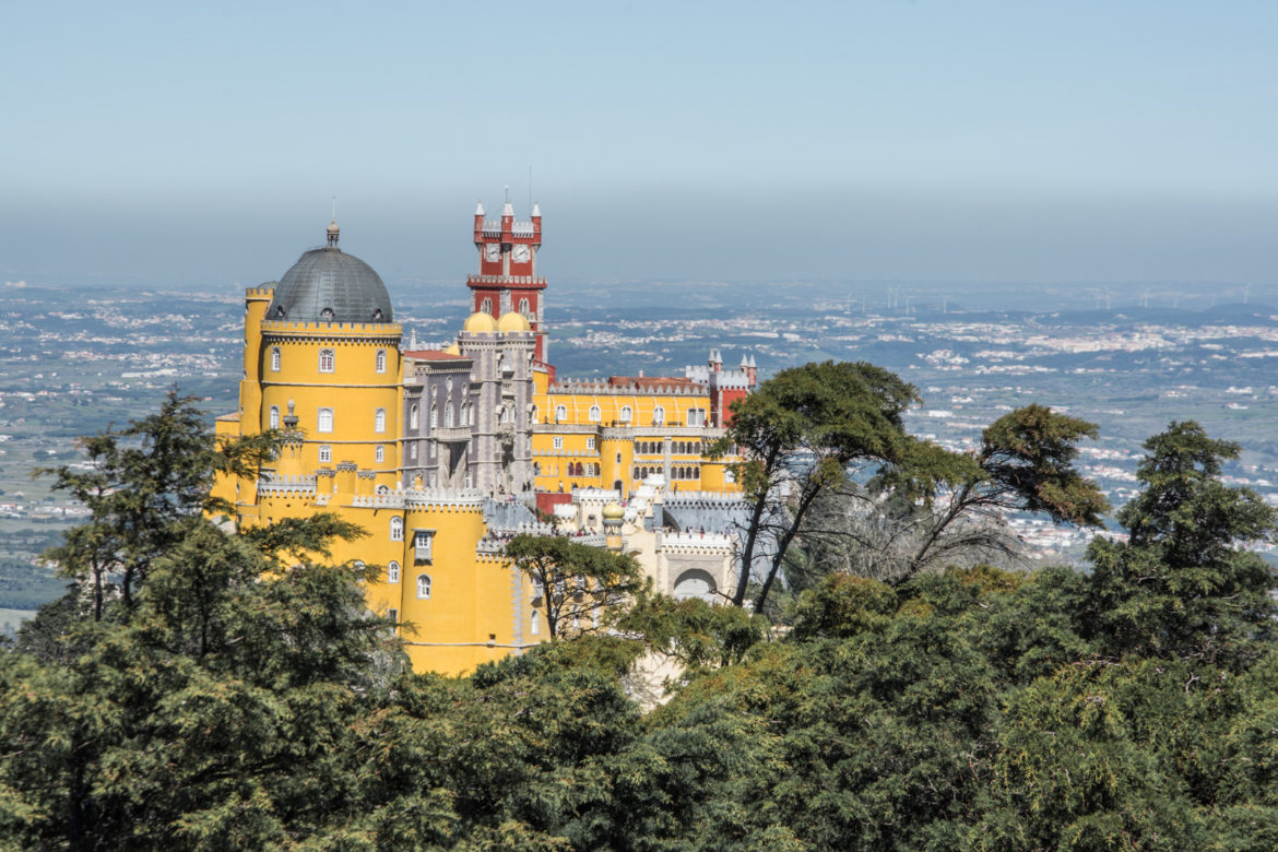 Day trip from Lisbon to Sintra is a perfect trip for a romantic soul and visiting Pena Palace will bring you back to your childhood.