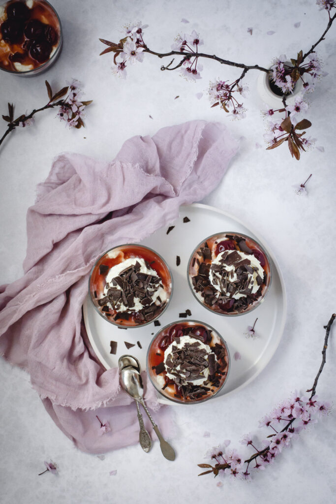 No-bake Black Forest Desserts are a yummy mixture of orange mascarpone cream with coffee chocolate sauce and cherry compote.